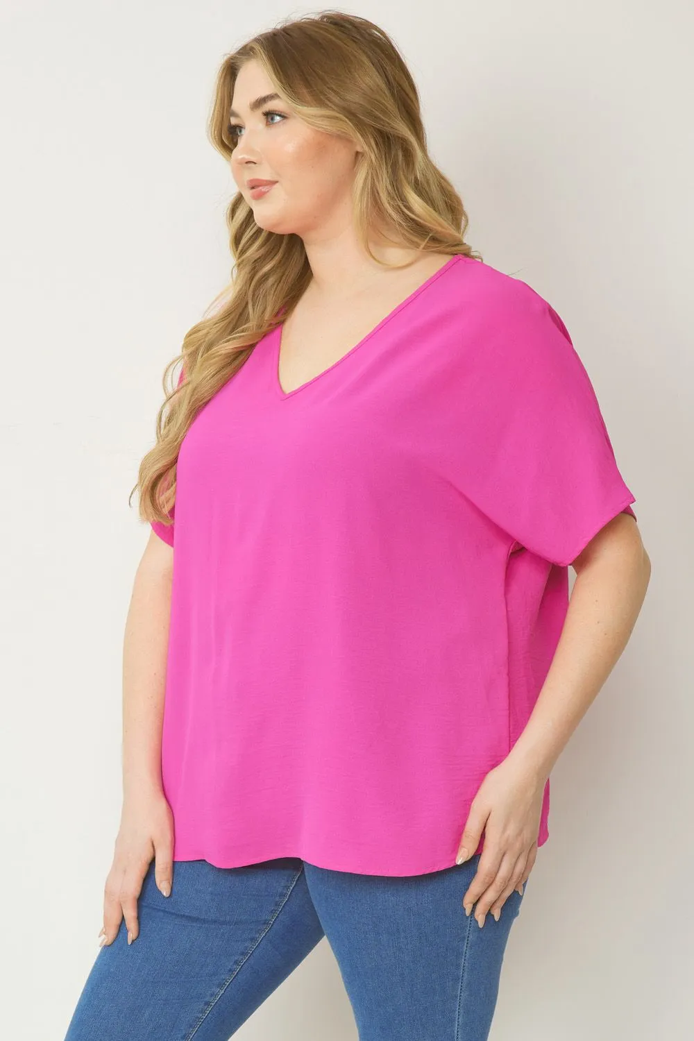 Entro Solid V-Neck Top Featuring Asymmetric Rounded Hem In Hot Pink Plus
